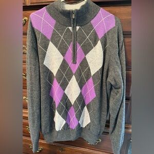 Men’s long sleeve 3/4 zip FootJoy sweater. Size L Slightly from smoke free home.